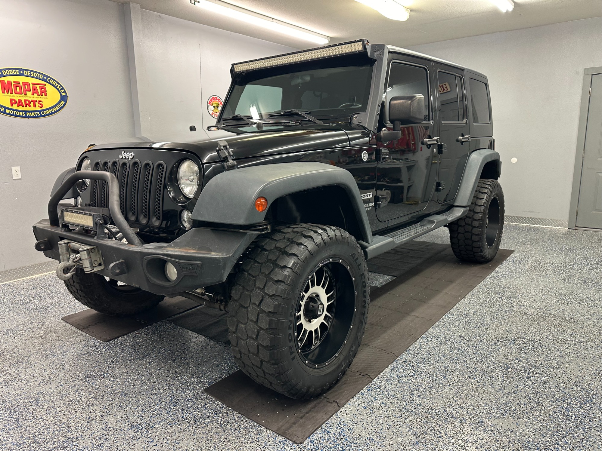 photo of 2015 Jeep Wrangler Unlimited Sport 4WD Lifted Low Miles!!!